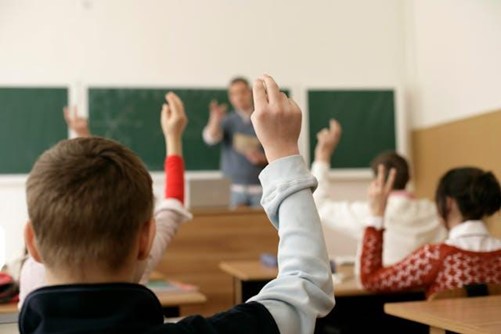 Hands raised with questions